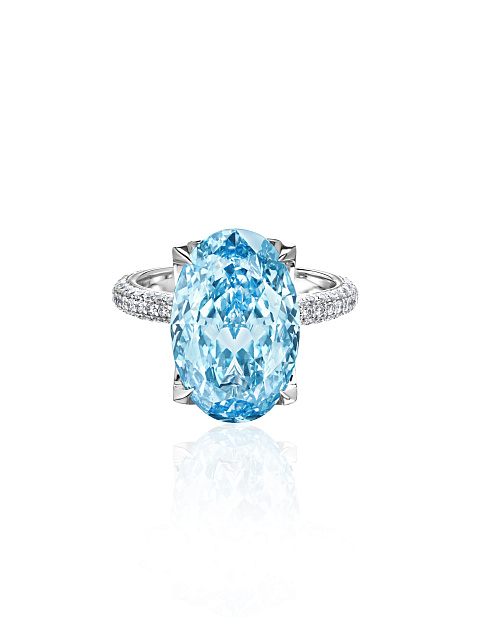 White gold ring with oval-cut blue diamond, 6