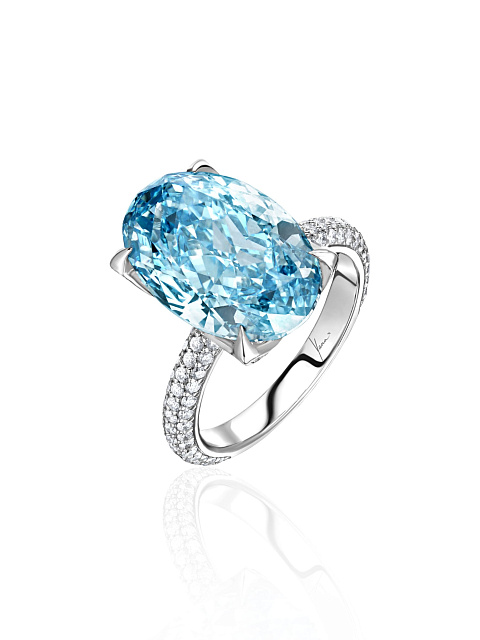 White gold ring with oval-cut blue diamond, 1