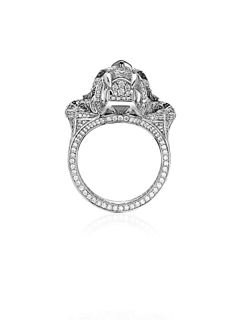 White gold ring with diamonds and emeralds, 7