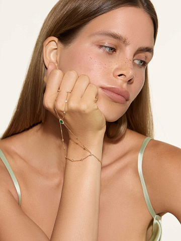 Slave bracelet in yellow gold with emerald and diamonds, 2