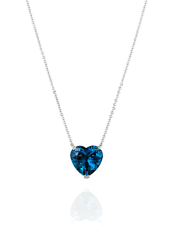 White gold necklace with a pendant with a heart-cut topaz, rock crystal and ruby, 1