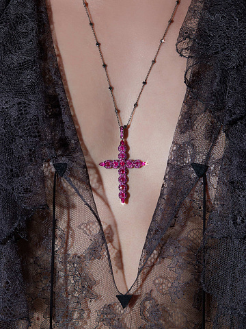 Cross-shaped pendant in blackened gold with rubies, 2