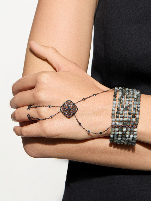 Slave bracelet in blackened gold with diamonds and “cat’s eye” beads, 3