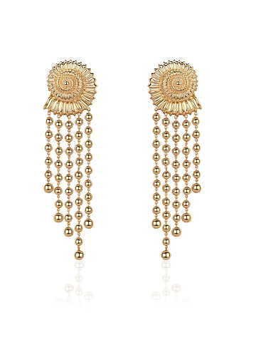 Long shell-shaped earrings in yellow gold, 1